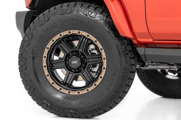 17x8.5 Rough Country 79 Series Black with Bronze Ring 5x4.5 ET0 Wheel Rim